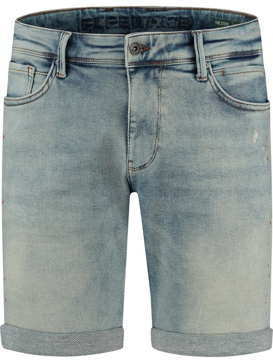 Denim short with bleached and rust colour spots in green-blue