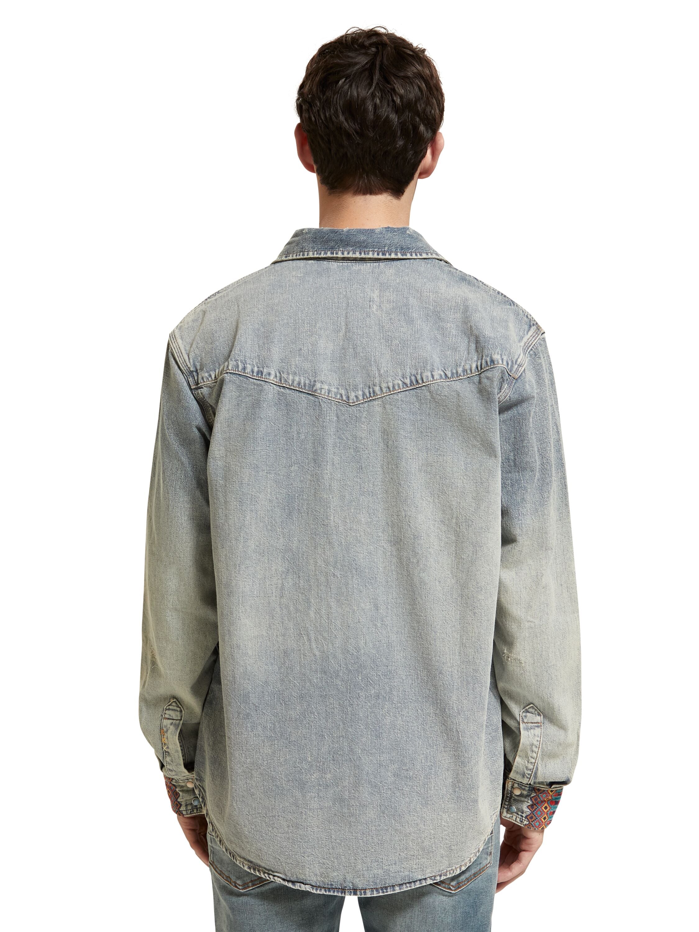 Denim western shirt with damages and embroidered cuffs Indigo