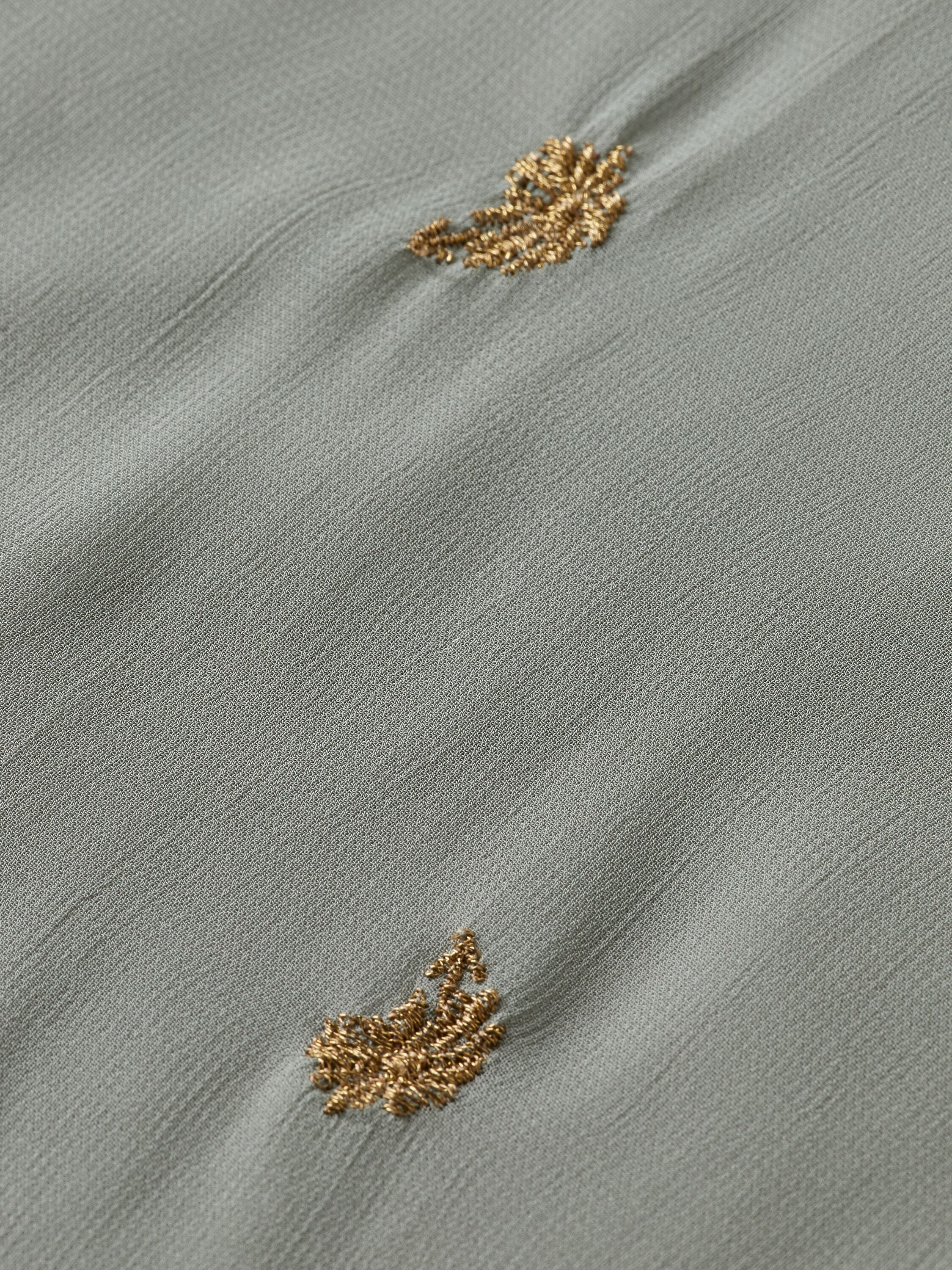 Embroidered top with tie neck Grey sheer jacquard