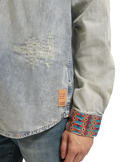 Denim western shirt with damages and embroidered cuffs Indigo