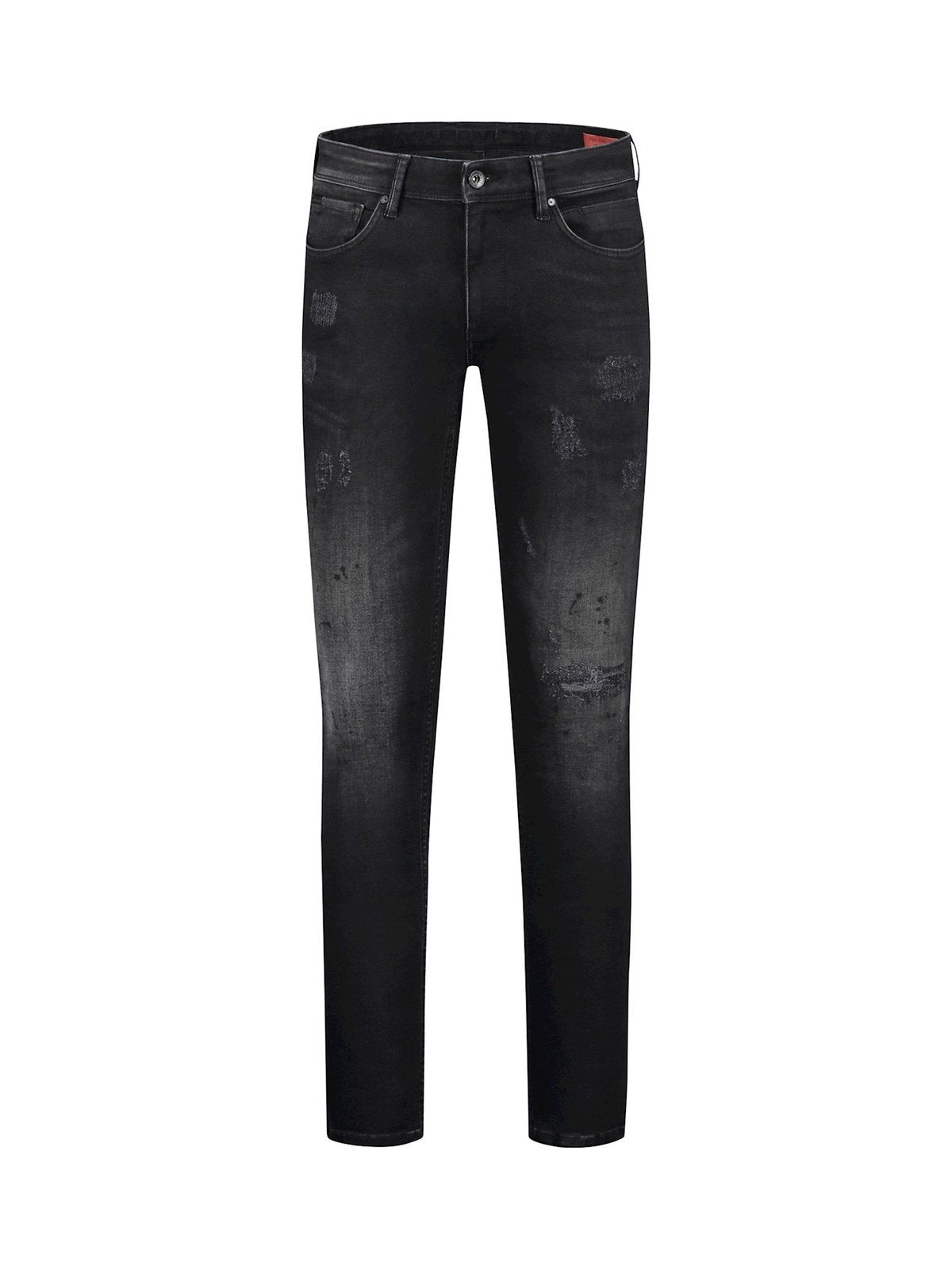 Skinny jeans with subtle damaging spots and black paint splashes