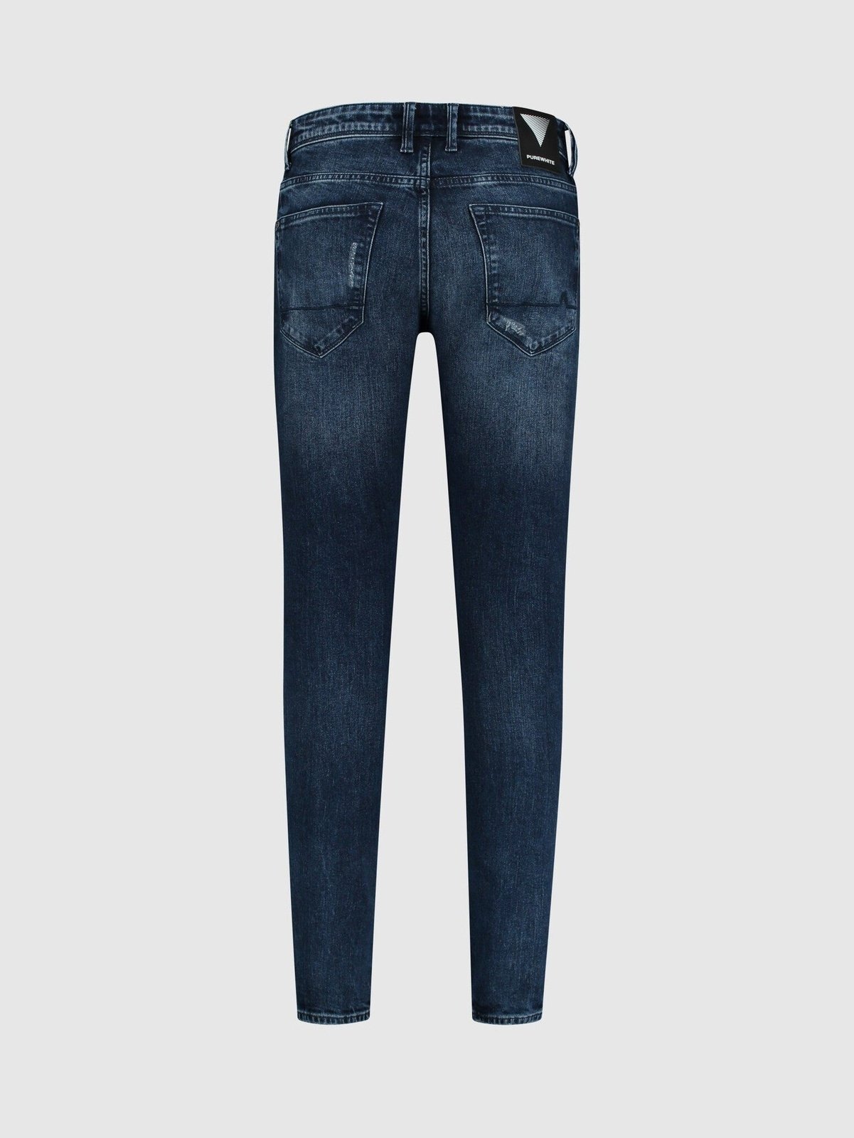 Skinny fit jeans with abrassions at pocket end